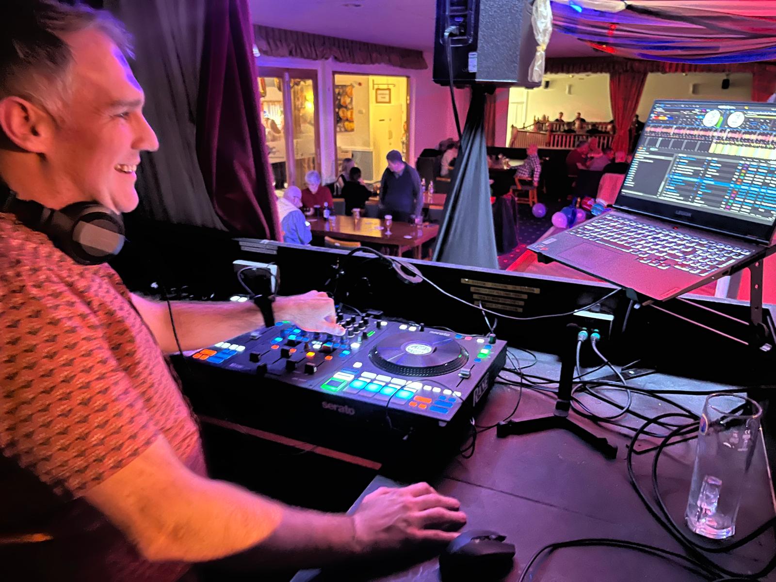 Chris Taylor DJing at an event